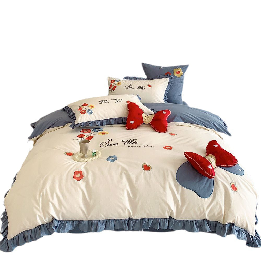 Ruffled Quilted Bedding Set with Embroidered Flower Appliqués and Decorative Bow Cushions