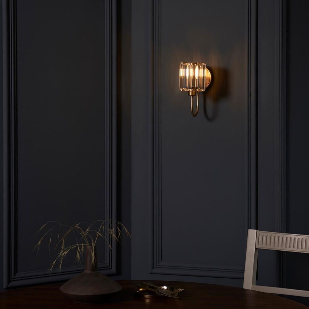 Antique Brass Wall Sconce with Faceted Shade